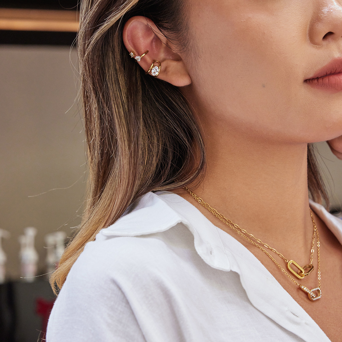 Wanxing europa y americana galvanizado 18K oro simple diamante auriculares de acero inoxidable personalidad transfronteriza universal no desvanecer auriculares mujeres