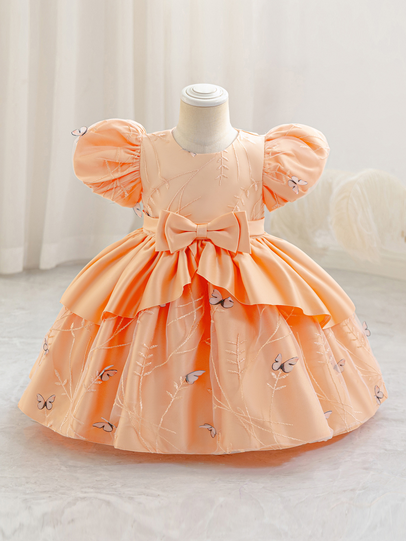 2025 nuevo bebé transfronterizo vestido infantil ropa de abrigo de arco vestido de bebé vestido vestido de abrigo al por mayor