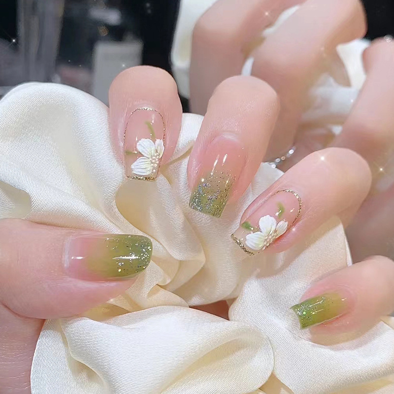 Romantic gradient glitter White Camellia manicure with fresh elegant green natural wear nail polish