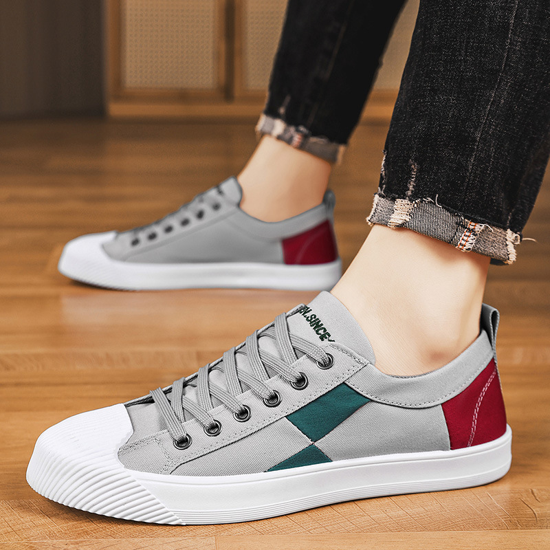 Las nuevas zapatillas de deporte de corte bajo de los hombres se pueden usar en cuatro estaciones, cómodas, transpirables, simples y elegantes, ligeras y de todo fósforo