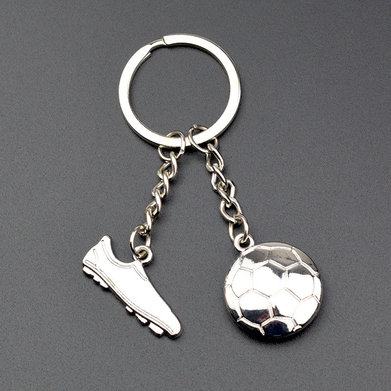 Serie de oro de aleación de venta transfronteriza caliente fútbol béisbol rugby sombrero hechicero puño llavero colgante mochila