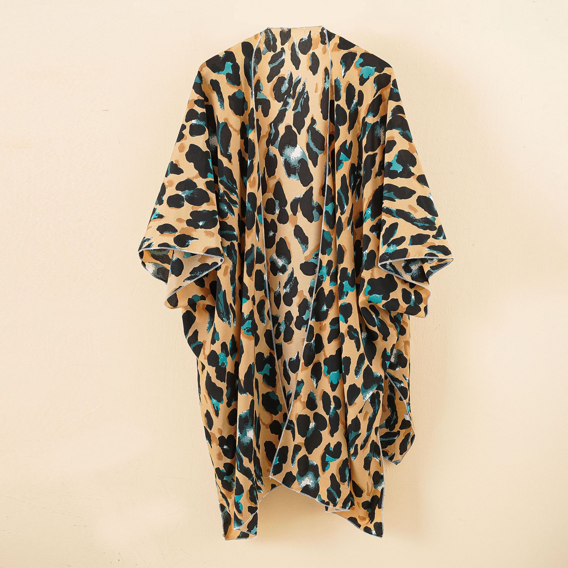 Cárdigan de longitud media con estampado de leopardo para mujer, estilo europeo y americano, sexy, para la playa, ropa de protección solar.