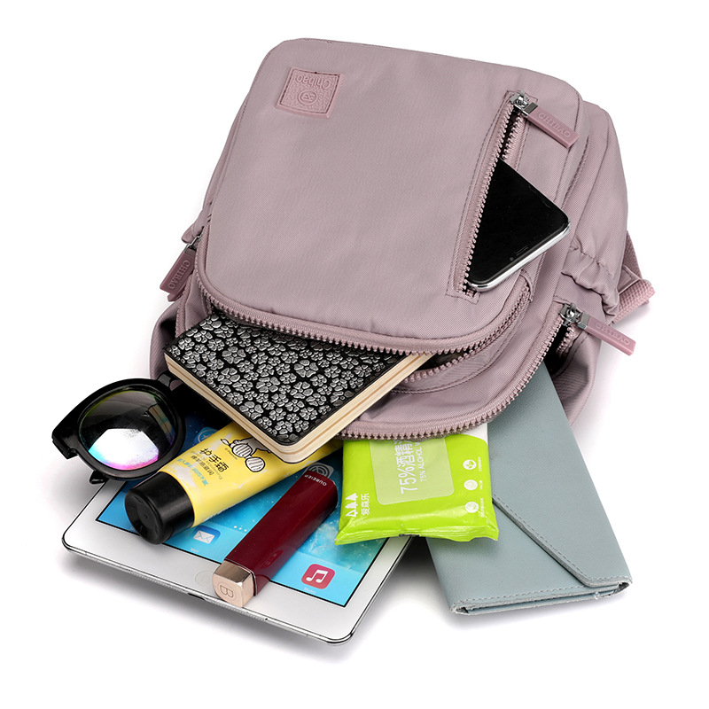 Mochila sencilla e informal para mujer, bolso portátil de gran capacidad para viajes y desplazamientos, mochila versátil de tela de nailon de gran capacidad para mujer