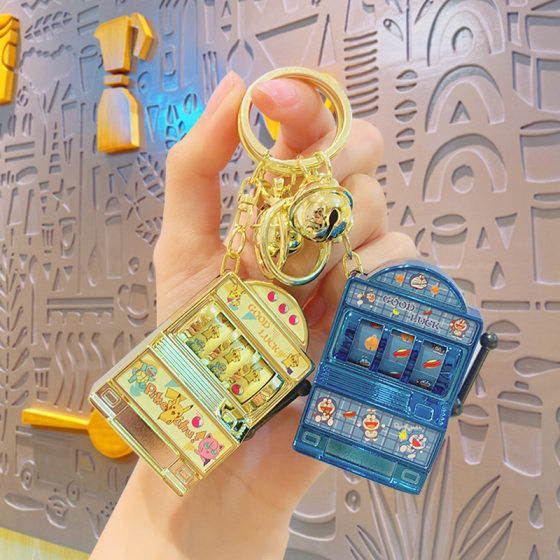 Exquisite fun cartoon game machine wholesale keychain jewelry doll small gift pendant couple key chain ornaments