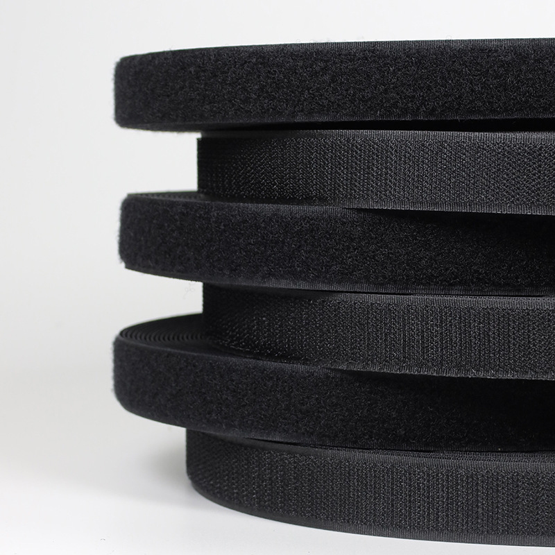 Fabricante mayorista de nylon velcro negro gancho texturizado ventana de ropa almacena velcro de hebilla blanca