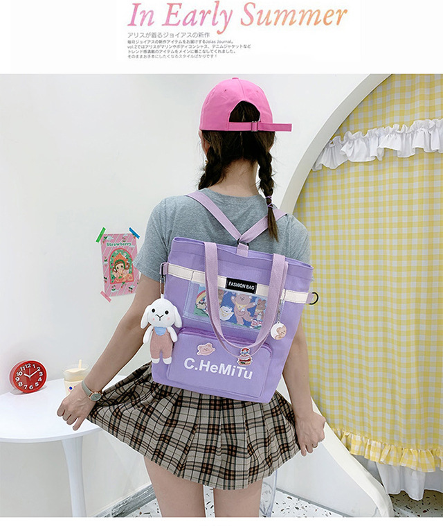 Korean-style canvas bag for girls with one shoulder, in the style of Harajuku, ulzzang, with a large capacity and contrasting colors, is a crossbody hand-held schoolbag for classes undefined