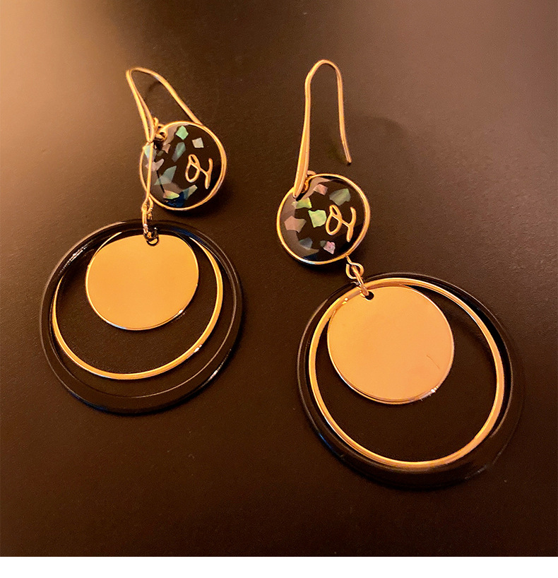 Metal geometric circle hollow out long niche design, fashionable earrings, simple and high-end style earrings_voghion.com