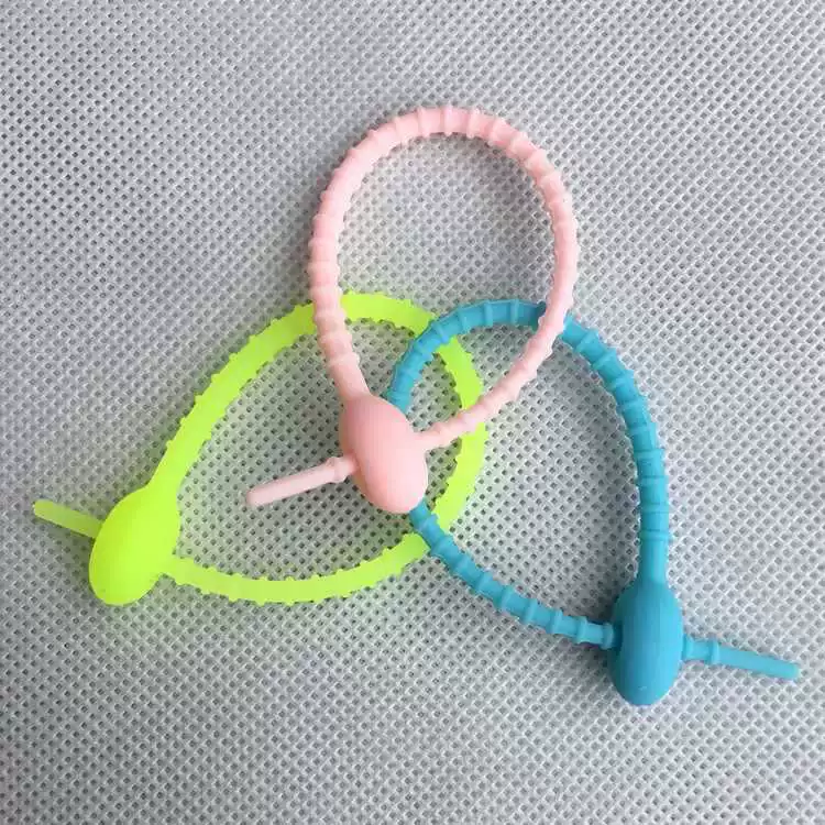 Cartoon storage system on a lace, keychain, multi-use elastic belt