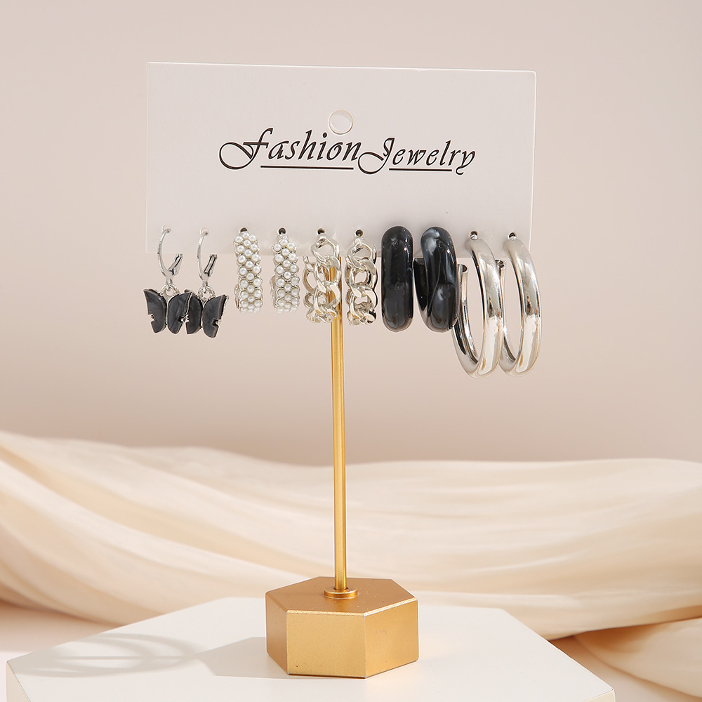 Einfache Elegante Perle Embedded Schwarz Schmetterling C-förmigen Acryl Ohrringe Set display picture 3
