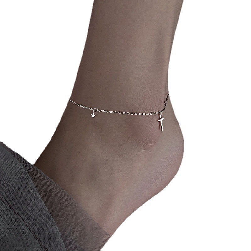 Joyería de plata nueva S925 plata esterlina tobillera para niñas de alto grado sentido nicho diseño luz lujo borla Cruz pierna decoración para damas