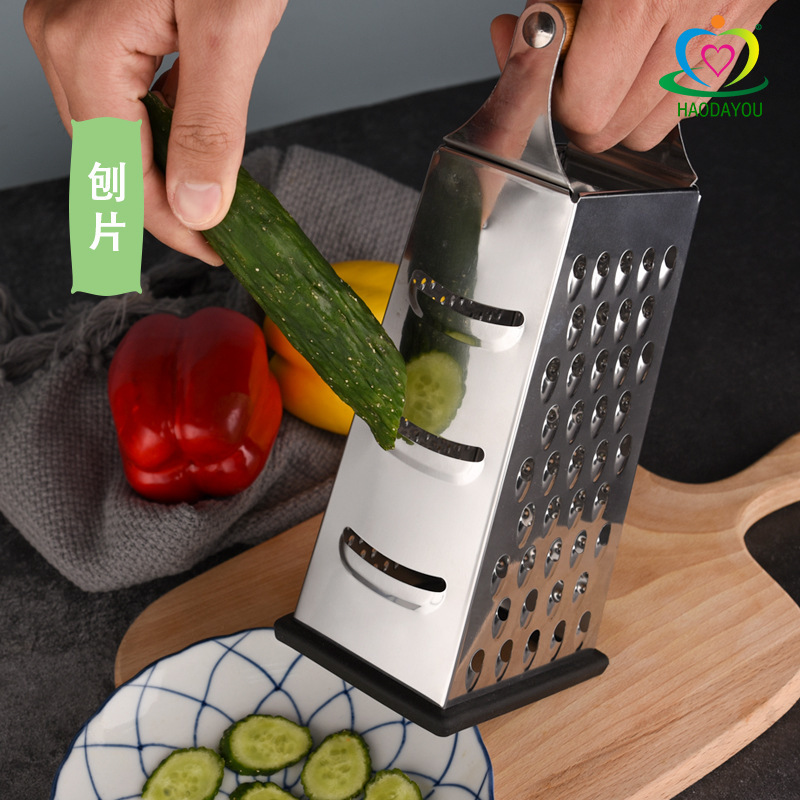 木の柄の野菜のおろし器の多機能の4面の野菜切り器のジャガイモの大根のおろし器の台所のステンレスのおろし器|undefined