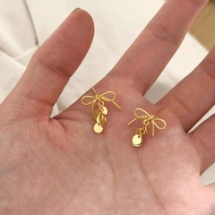 小香風蝶結びのおしゃれなイヤリングの精緻な気質の女性のピアスの軽豪華な大衆のデザイン感の個性的な耳飾り