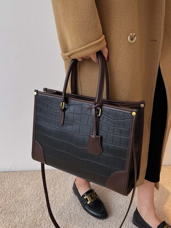 Bolso Tote portátil transfronterizo de gran capacidad para mujer 2025 nuevo modelo retro patrón de piedra contraste bolso de mensajero de hombro de viajero