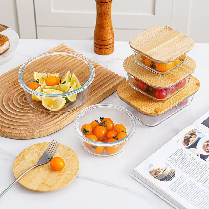 Fiambrera de vidrio redonda, horno de microondas, horno de calefacción especial, caja de mantequilla de frutas frescas con separación de arroz
Cubierta de bambú y madera