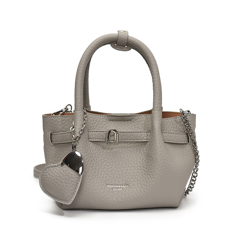 Tendencia versátil bolso de mano para mujeres 2025 nuevo estilo simple textura de transporte de tren mochila de alta calidad bolso de brazo de moda