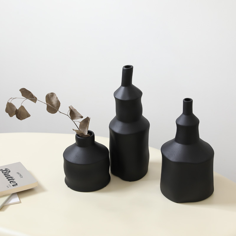 Viento tranquilo de cerámica blanca y negra ornamentos decorativos para la sala de estar decorativos para el hogar flor seca flor de escritorio