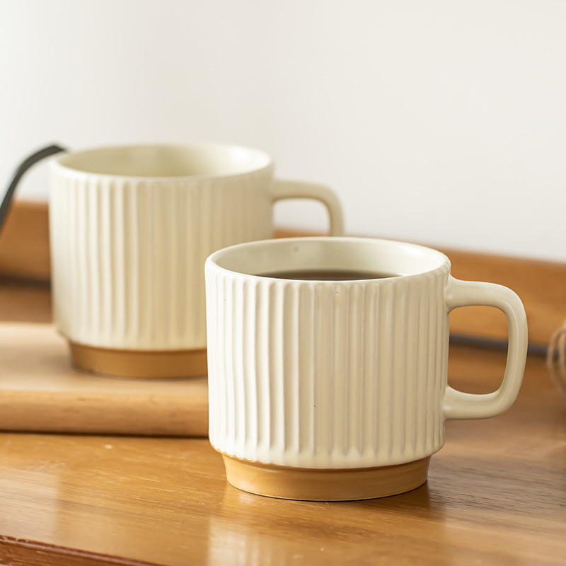 Taza en relieve retro de alto valor Taza de té de alta calidad Taza de leche Taza de agua de cerámica Taza de café Taza al por mayor