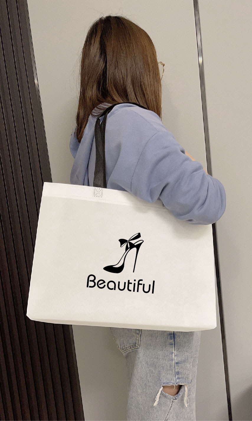 White black handheld bag