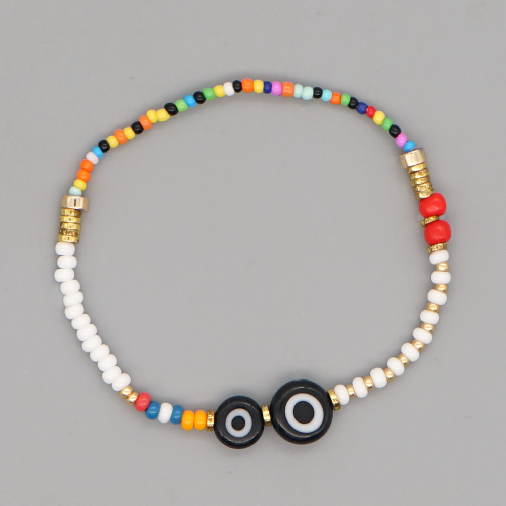 Yeux De Verre Noir Couleur Perles De Riz Bracelet Bijoux En Gros Nihaojewelry display picture 1