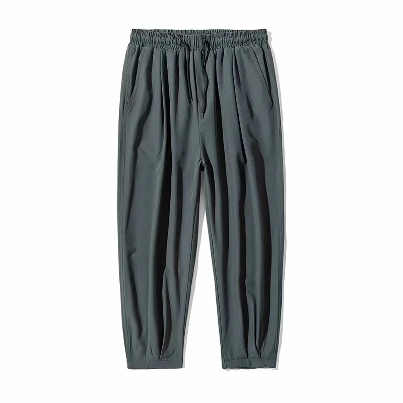 Pantalones casuales de seda de hielo de verano para hombres pantalones sueltos más tamaño noveno pantalones gordos deportes pantalones ultrafinos pantalones de hombre