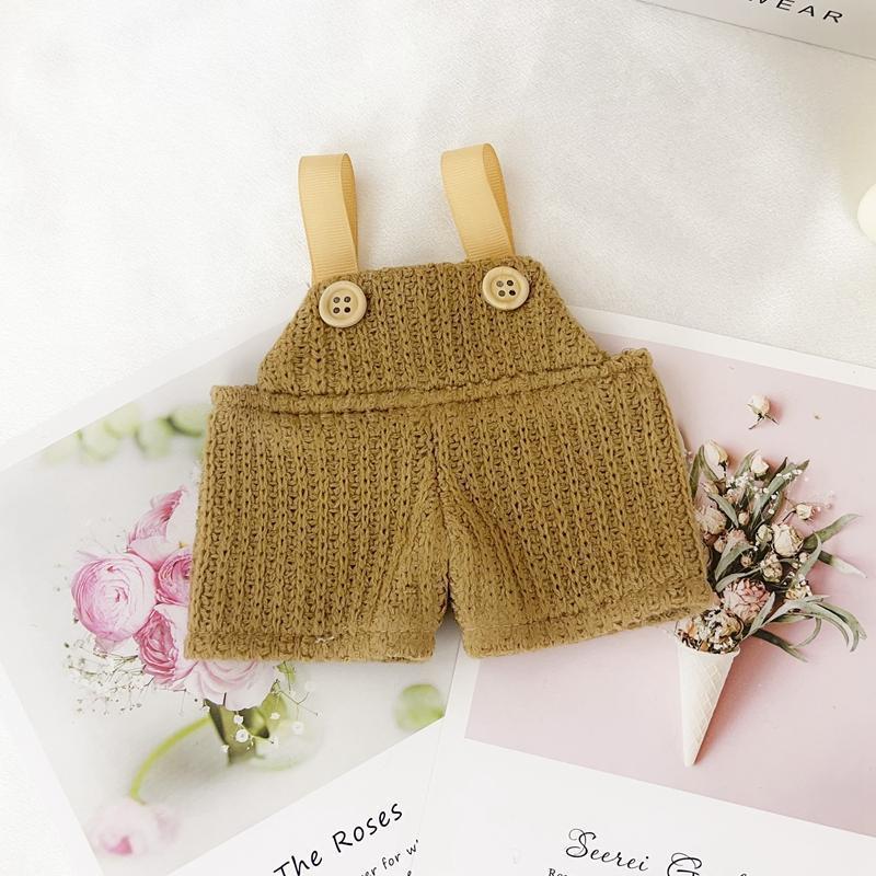 Brown overalls (long in the front and short in the back)