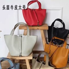 クロスボーダー本革レディースバッグバケットバッグ多用途22センチメートル大型野菜バスケット第一層牛革レディース2025新しいハンドバッグ