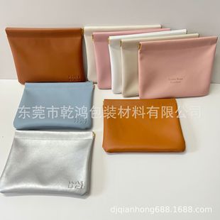 Manufacturer Wholesale Shrapnel Pu Leather Bag Spring Piece Tight Mouth Headphone Storage Bag Data Cable Lipstick Jewelry Bag