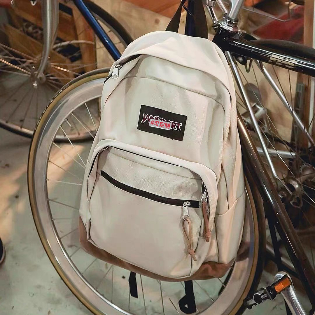 卸売りシギの皮のつづり合わせのランドセルの暮光の城の同じタイプのリュックサックのジェスjsカバンのパソコンのカバンの復古バッグ