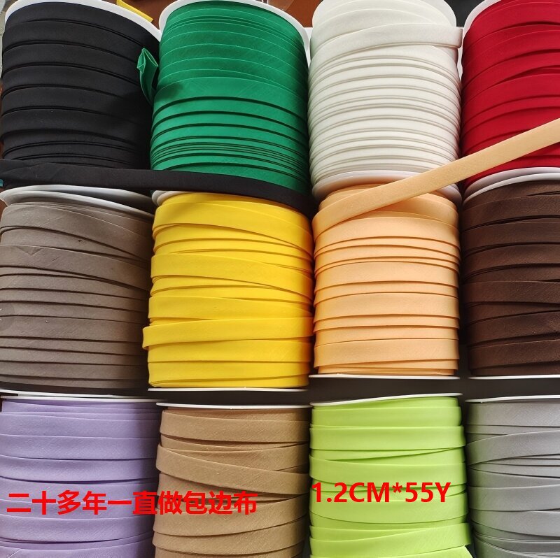 Factory direct supply double folding edging strip four fold non-ironing rolled with red roll DIY cheongsam edging with polyester cotton 1.2 Factory direct supply double folding edging strip four fold non-ironing rolled with red roll DIY cheongsam edging with polyester cotton 1.2