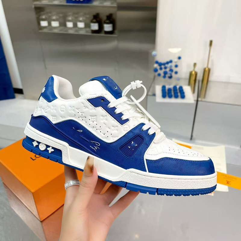 Zapatos de moda europeos Guangzhou de alta versión驴 entrenador zapatos deportivos ociosos de cuero universal para hombres y mujeres