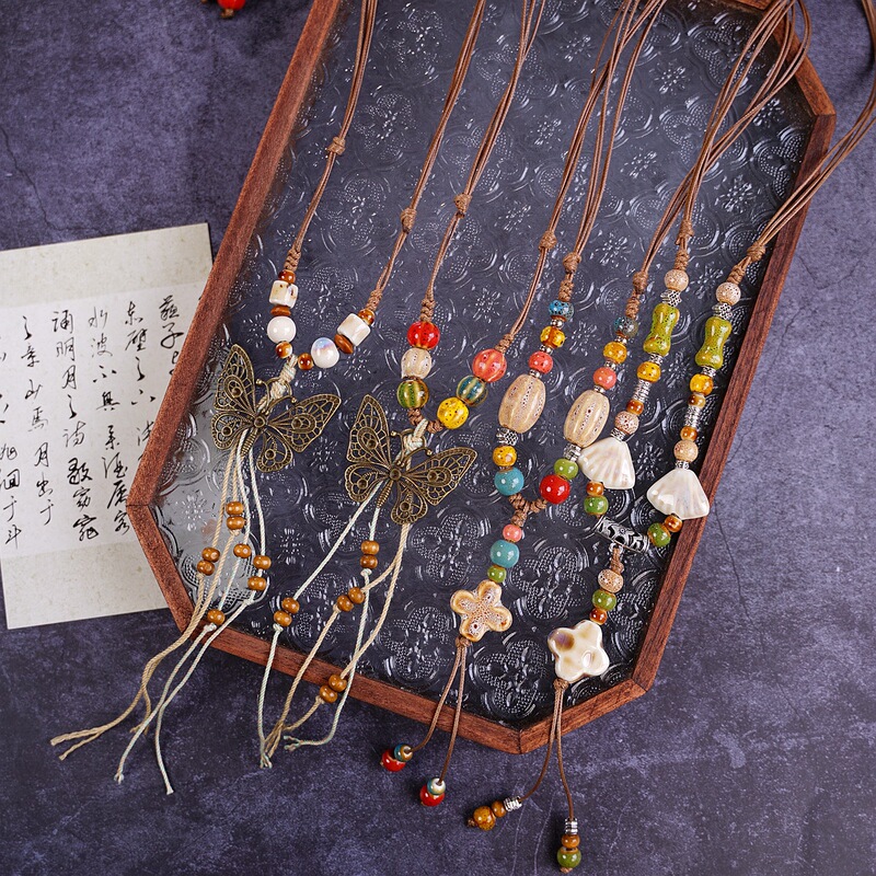 Jingdezhen ceramic necklace female light luxury niche autumn and winter butterfly sweater necklace female cross-border jewelry a generation of hair