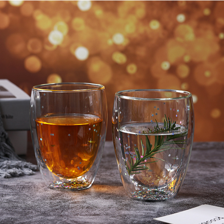 Sequinilla personalizada doble aislamiento de vidrio estrella taza logotipo personalizado taza de regalo taza de huevo transparente fabricante e