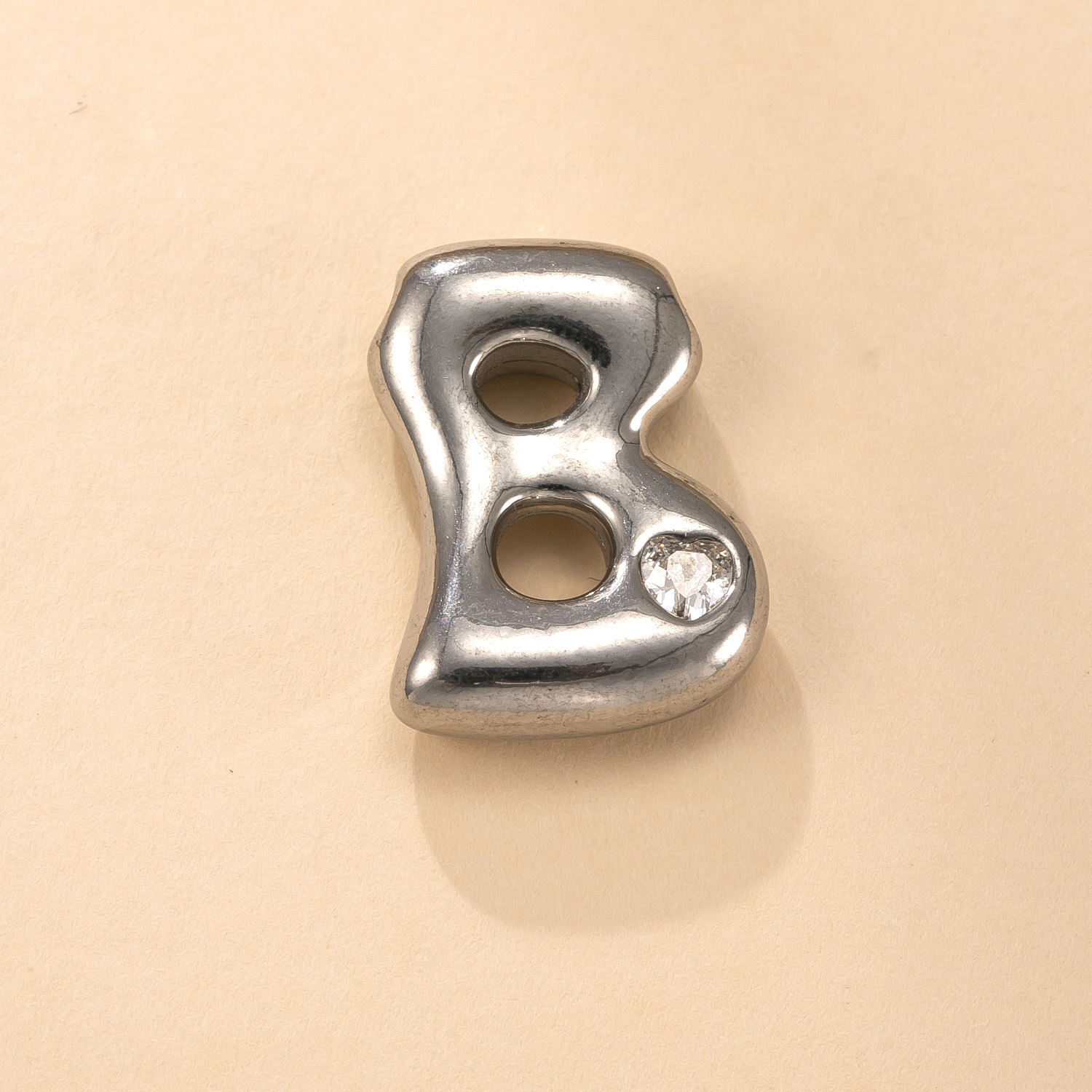 Colgante único transfronterizo de joyería de acero inoxidable fundición con incrustaciones de diamantes de color 26 letras accesorios de collar moda simple pulsera briy