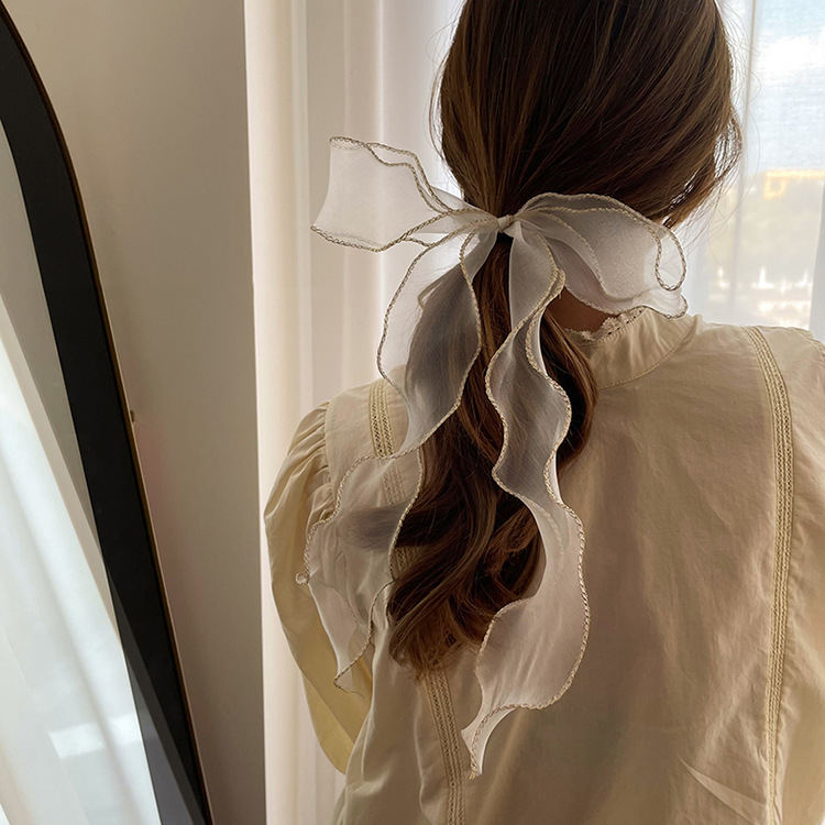 Transparent hairgrip with bow