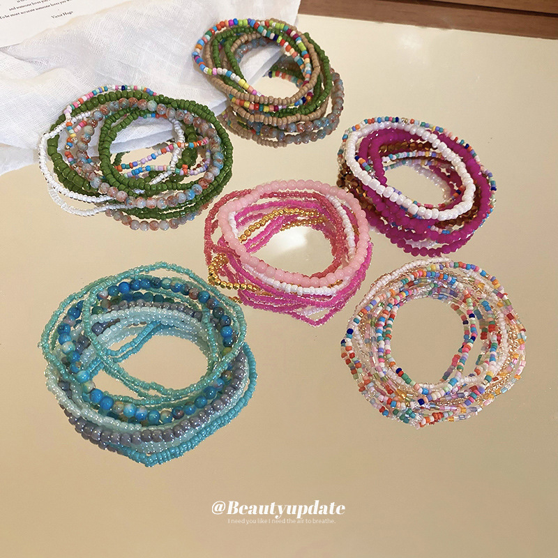 Pulsera de cuentas de arroz apilada de estilo bohemio, juego de siete piezas, pulsera de dopamina de alta calidad, joyería fresca de nicho al por mayor