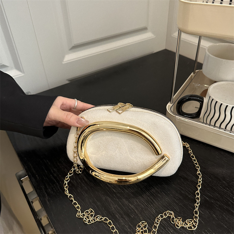 2025 nuevo bolso de moda de mujer caja redonda mano agarrada mini bolsa de metal retro cadena de hombro bolso de hombro