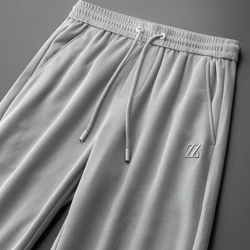 Herrenbekleidung Freizeithosen für Männer dünne Strickstickerei gepresster Kleber dreidimensionaler Modetrend All-Match-Sport-Slim-Fit-Jogginghose für Männer_voghion.com