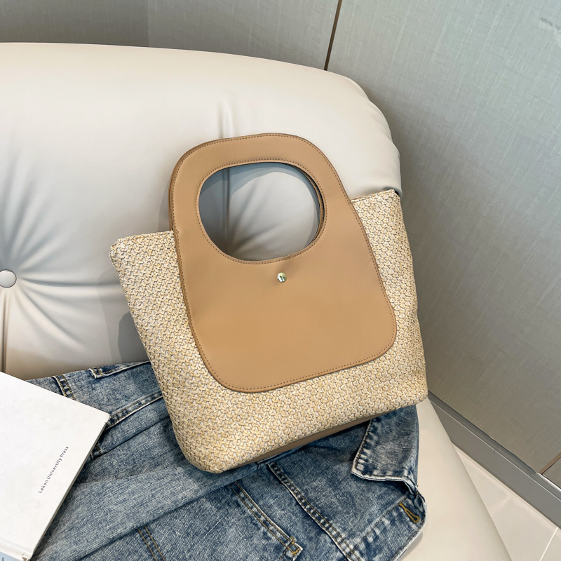 Bolsa de paja de empalme retro 2026 nueva bolsa de moda femenina minimalista de gran capacidad bolsa de tejido de arte de marea