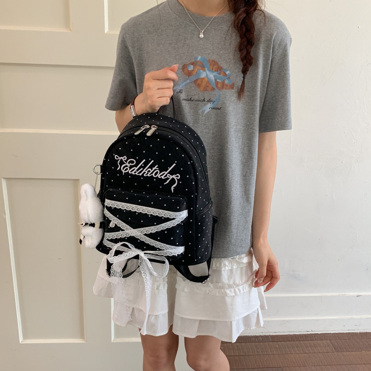 Mochila de letras onduladas para mujeres 2026 nuevo arco de encaje dulce mochila diaria mochila de verano ligera