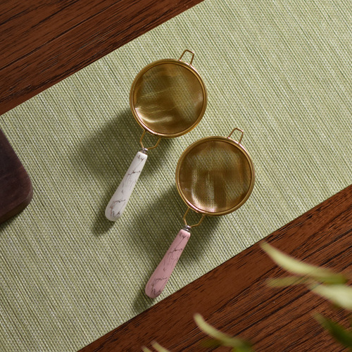 Manufacturer wholesale 304 stainless steel tea leak tea strainer ceramic handle tea filter tea infuser tea set accessories