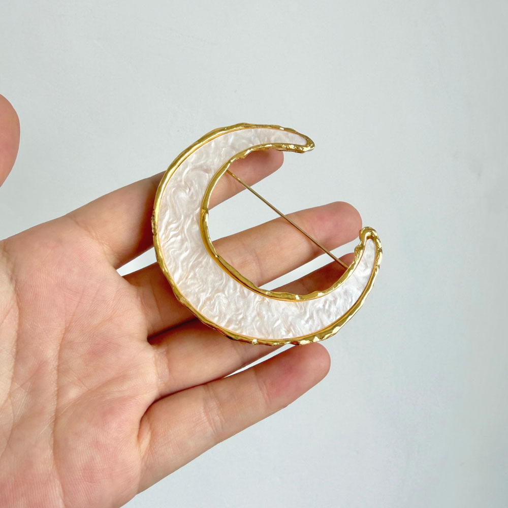 French vintage crescent moon brooch, red and white enamel with metal edges, niche accessory for suit jackets
