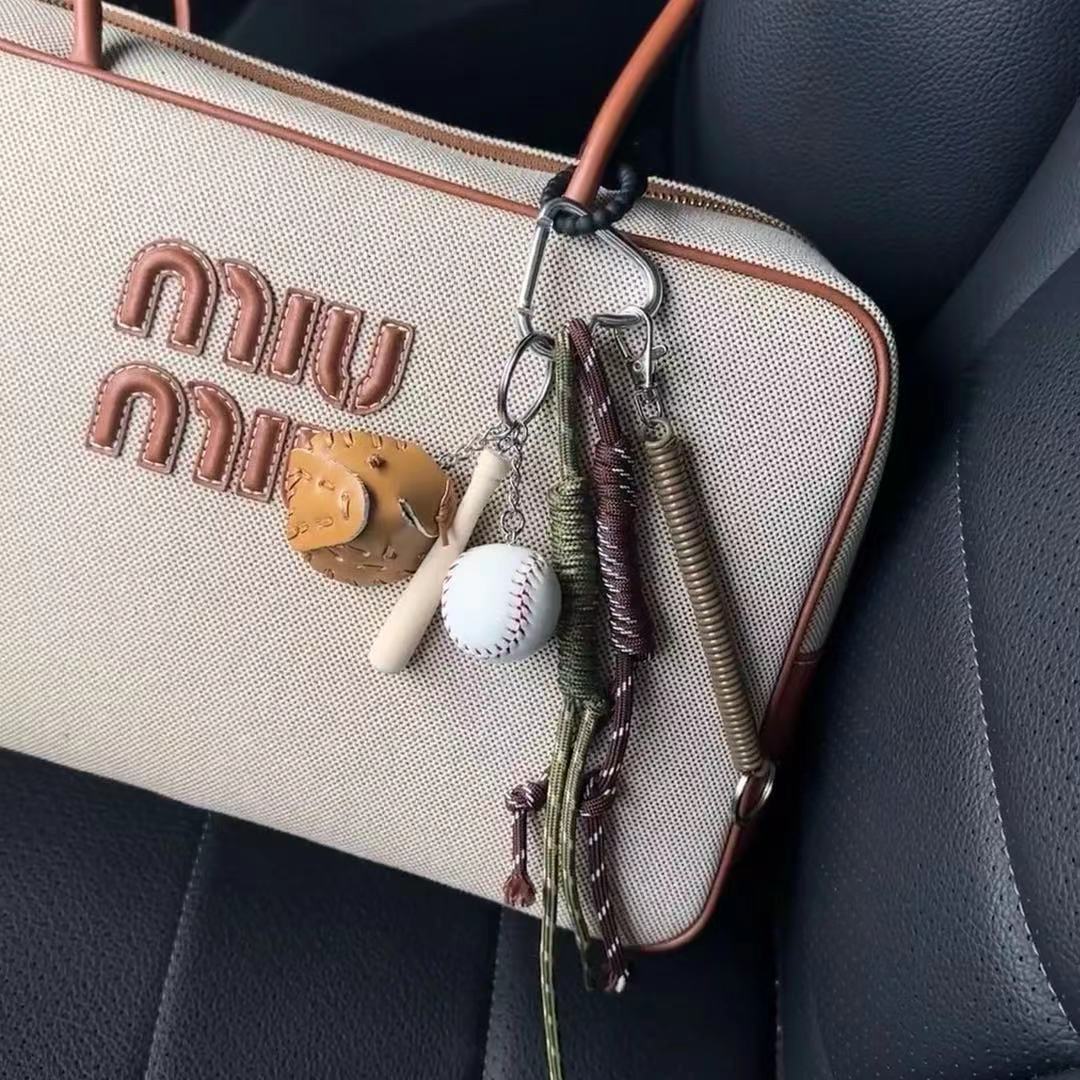 Brown and green baseball miu style pendant