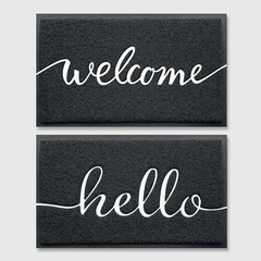 アマゾンは国境を越えてhello/welcomeが入り口に入って、じゅうたんの床マットをこすりました