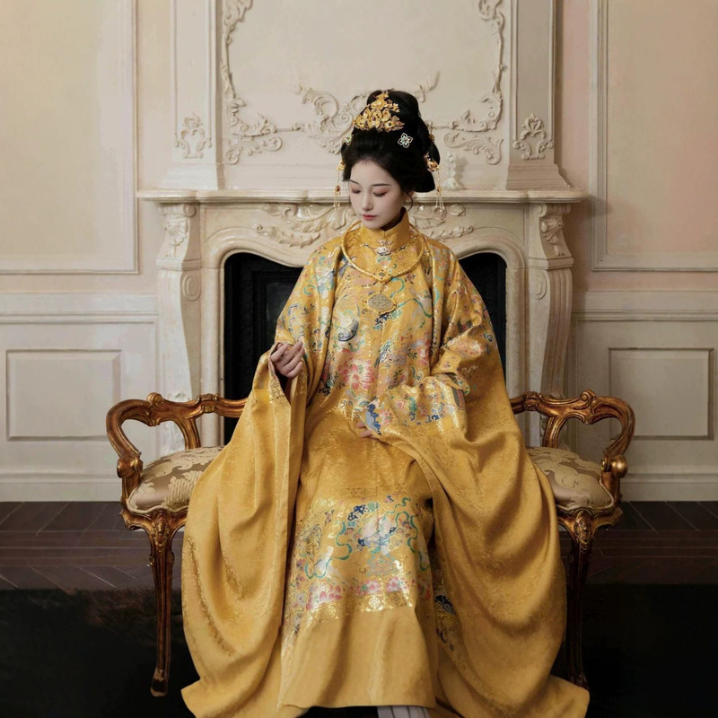 Elegant Ming Dynasty-style Hanfu for noblewomen, featuring intricate gold embroidery and a mandarin collar, perfect for a golden palace-themed photoshoot Elegant Ming Dynasty-style Hanfu for noblewomen, featuring intricate gold embroidery and a mandarin collar, perfect for a golden palace-themed photoshoot