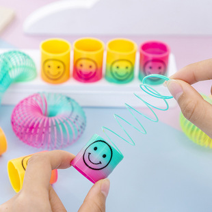 Mini rainbow ring children's cartoon smiley spring ring folding ring Small size rainbow ring kindergarten activity small gift