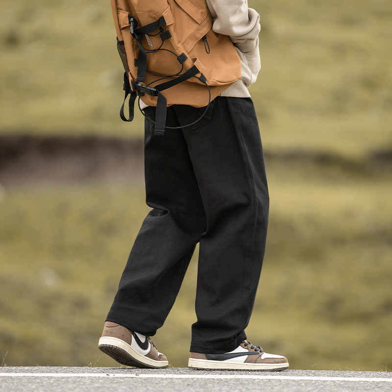 Pantalones casuales sueltos rectos de microperfil para hombre 2025 primavera nuevo estilo montaña pantalones retro de sarga de textura de algodón puro de todo fósforo