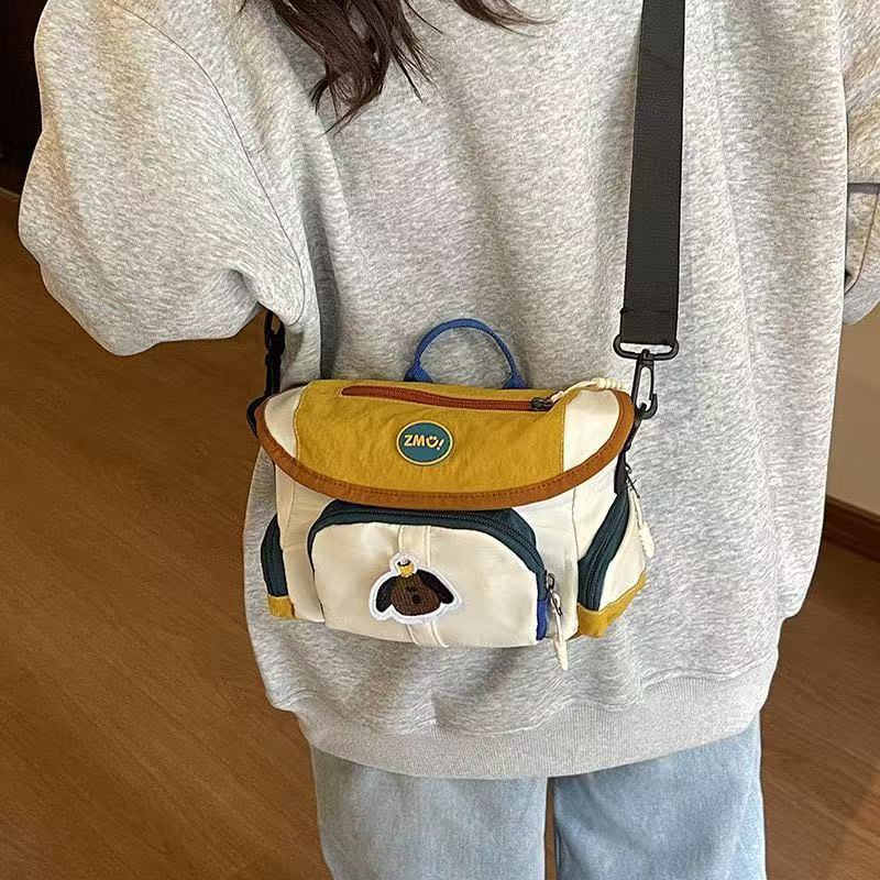 New color-blocked camera bag, single-shoulder multifunctional casual commuter small bag, crossbody bag, photography bag, lightweight storage bag