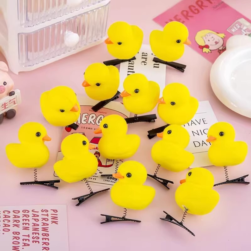 Pequeño pato amarillo clip para el pelo niños venden artefactos encantadores molino de viento primavera tocado clase de jardín de infantes para compartir pequeños regalos