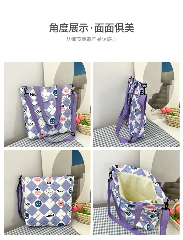 New nylon large-capacity hand-held student storage bag, cute cartoon outdoor bento bag, high appearance level single-shoulder women's bag Item Picture