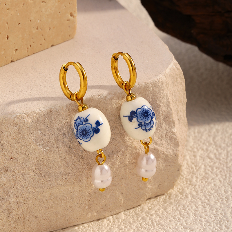 Europa y los Estados Unidos más vendidos antiguos aretes de cerámica azul y flor serie de aretes de cerámica nuevos aretes de estilo chino diseño temperamento estilo anillo redondo